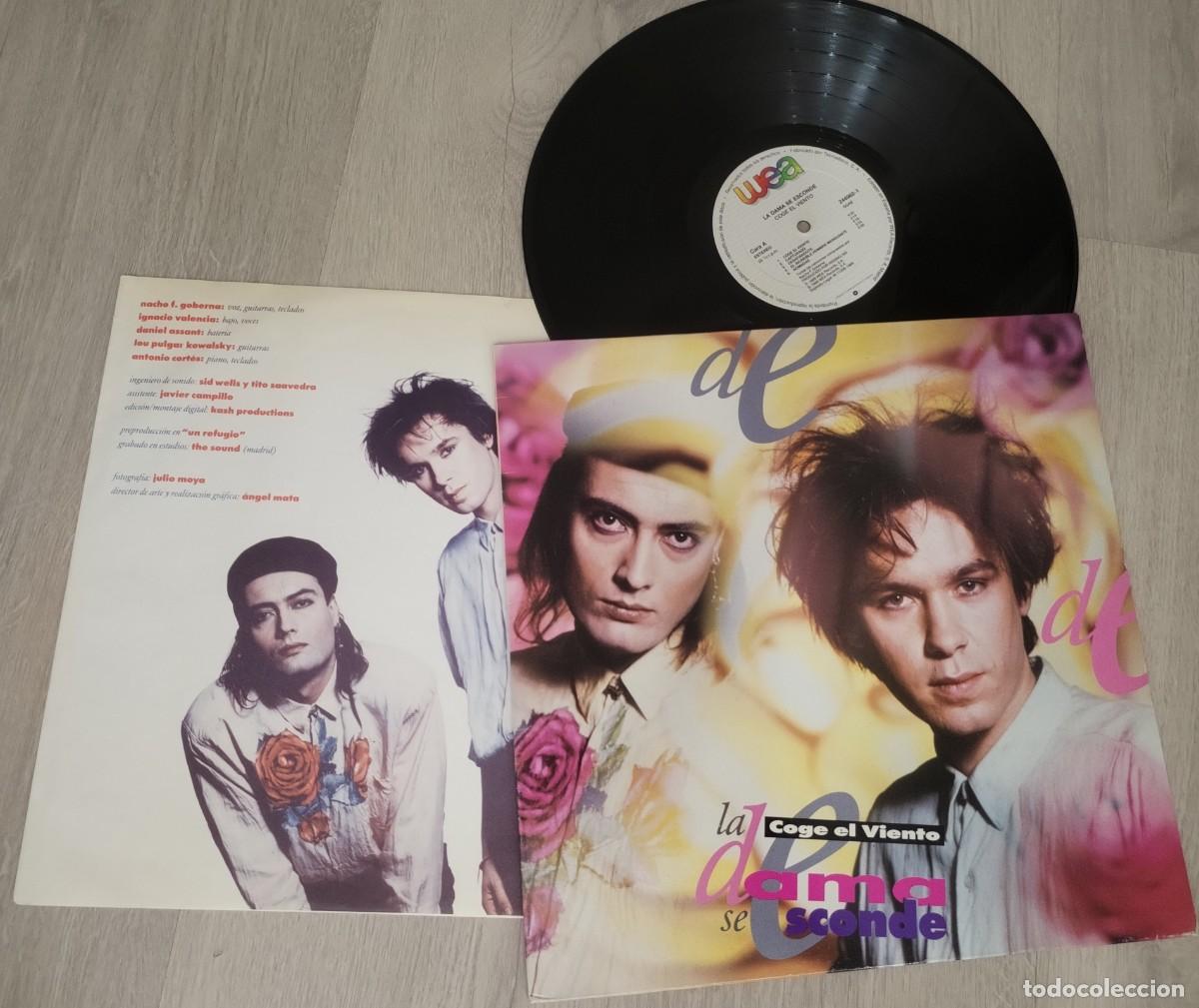 Discos de vinilo: LA DAMA SE ESCONDE - COJE EL VIENTO ..LP CON LETRAS DE 1989 WEA RECORDS..CONTIENE EL HIT. CAPTURADO