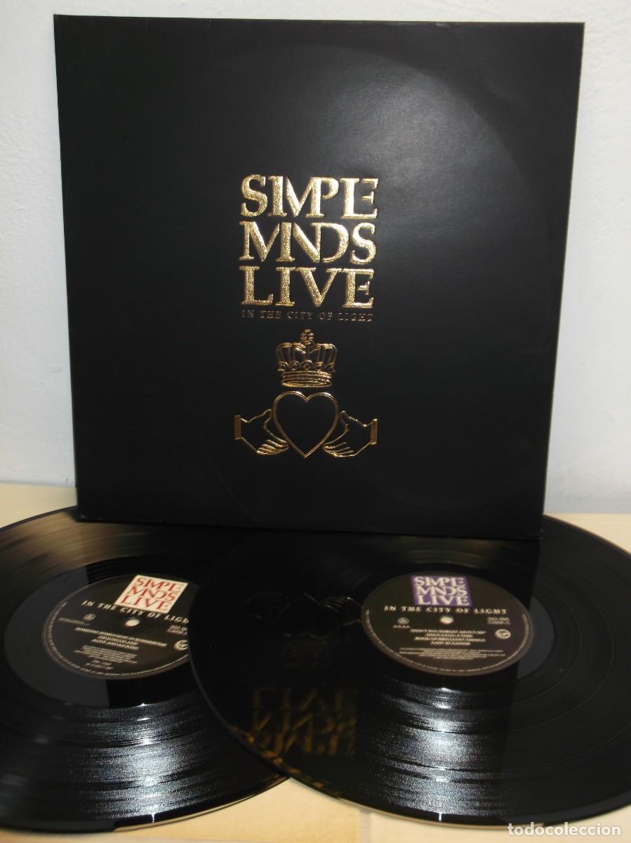 Discos de vinilo: Simple Minds -In the city of light 1986 + LIBRETO DE 8 PAGS 2 X LP