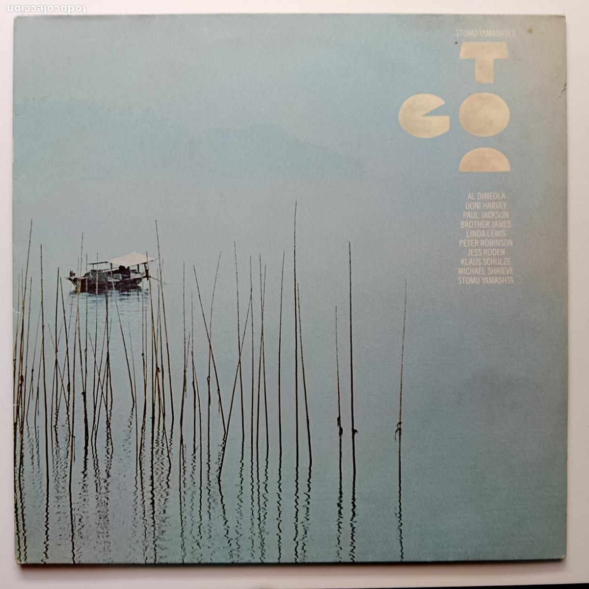 Discos de vinilo: Stomu Yamashta's Go-Go Too (LP Arista 1977) jazz fusion. Klaus Schulze, Steve Winwood, King Crimson.
