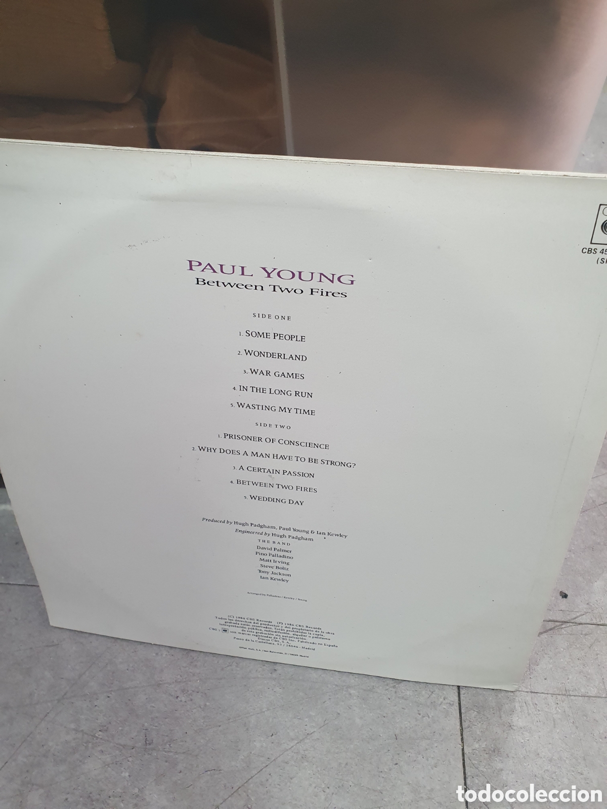 Discos de vinilo: LP. Paul Young. Between two fires. - Foto 2