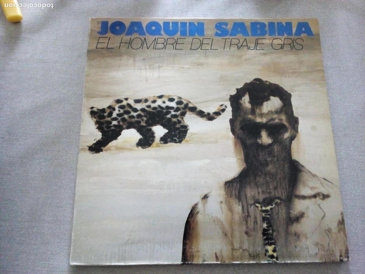 Discos de vinilo: JOAQUIN SABINA EL HOMBRE DEL TRAJE GRIS LP GATEFOLD CON INSERTO 1988