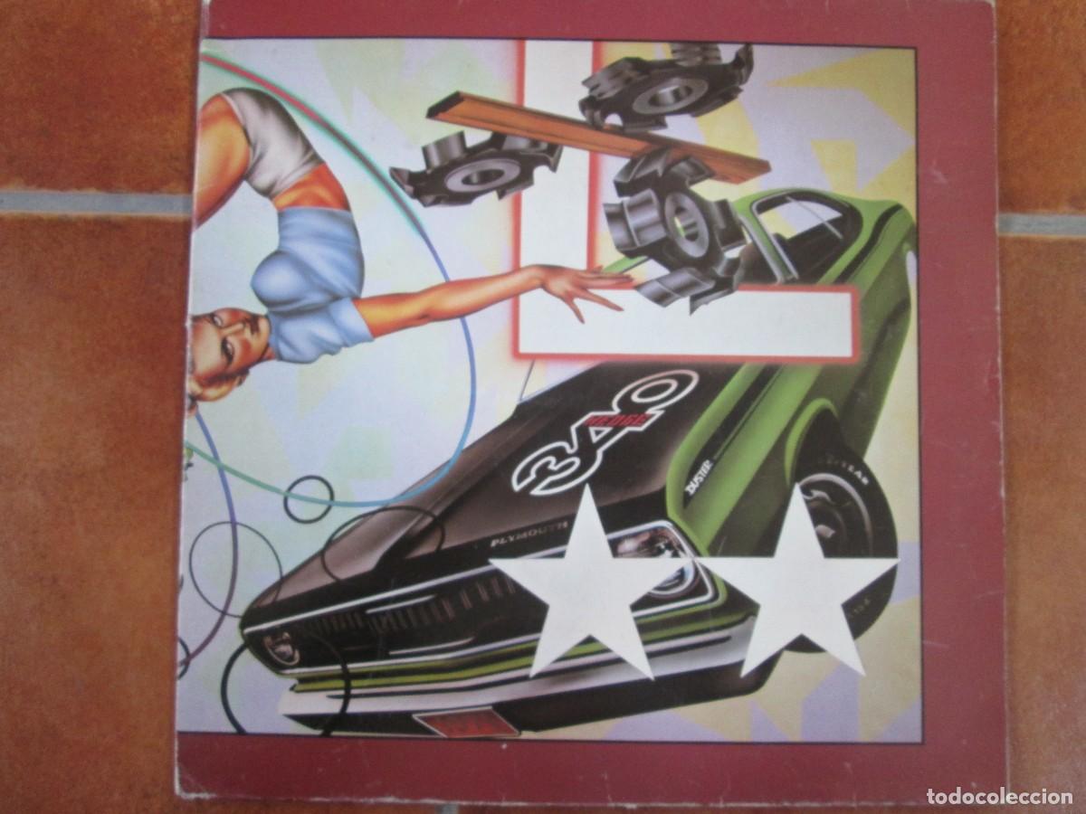Discos de vinilo: TEH CARS - Heartbeat City. LP, edici&oacute;n espa&ntilde;ola 12&rdquo; 1984. Insert. Carpeta abierta. Buen estado. VG