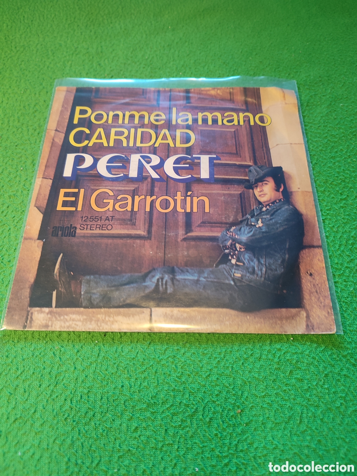 Discos de vinilo: Peret - Ponme la mano Caridad / El garrotin