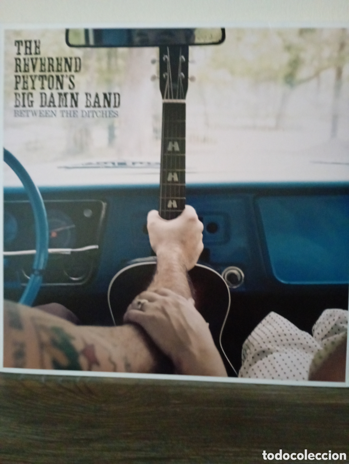 Discos de vinilo: The reverend Peyton's Big damn band, Between the ditches 2012.