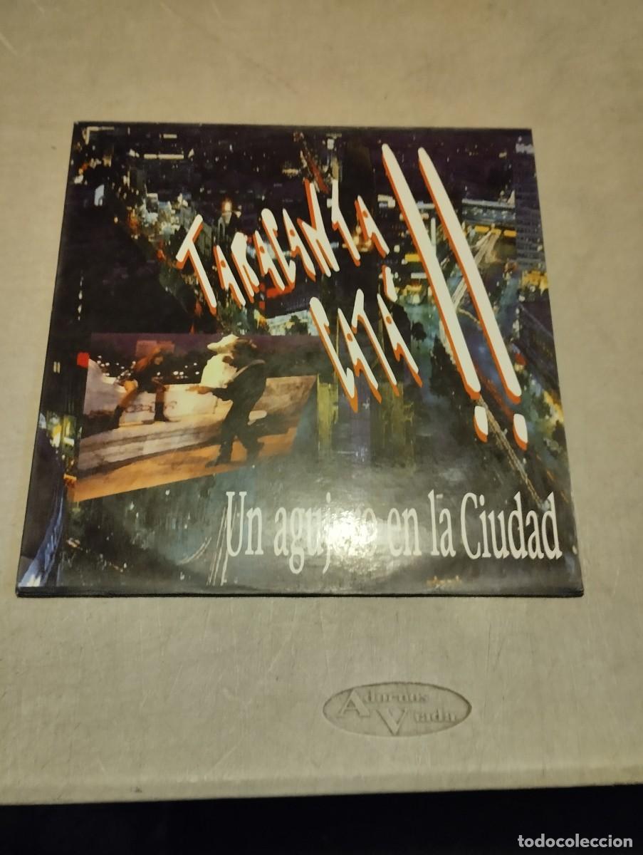Discos de vinilo: TARACANTA CATA LP UN AGUJERO EN LA CIUDAD