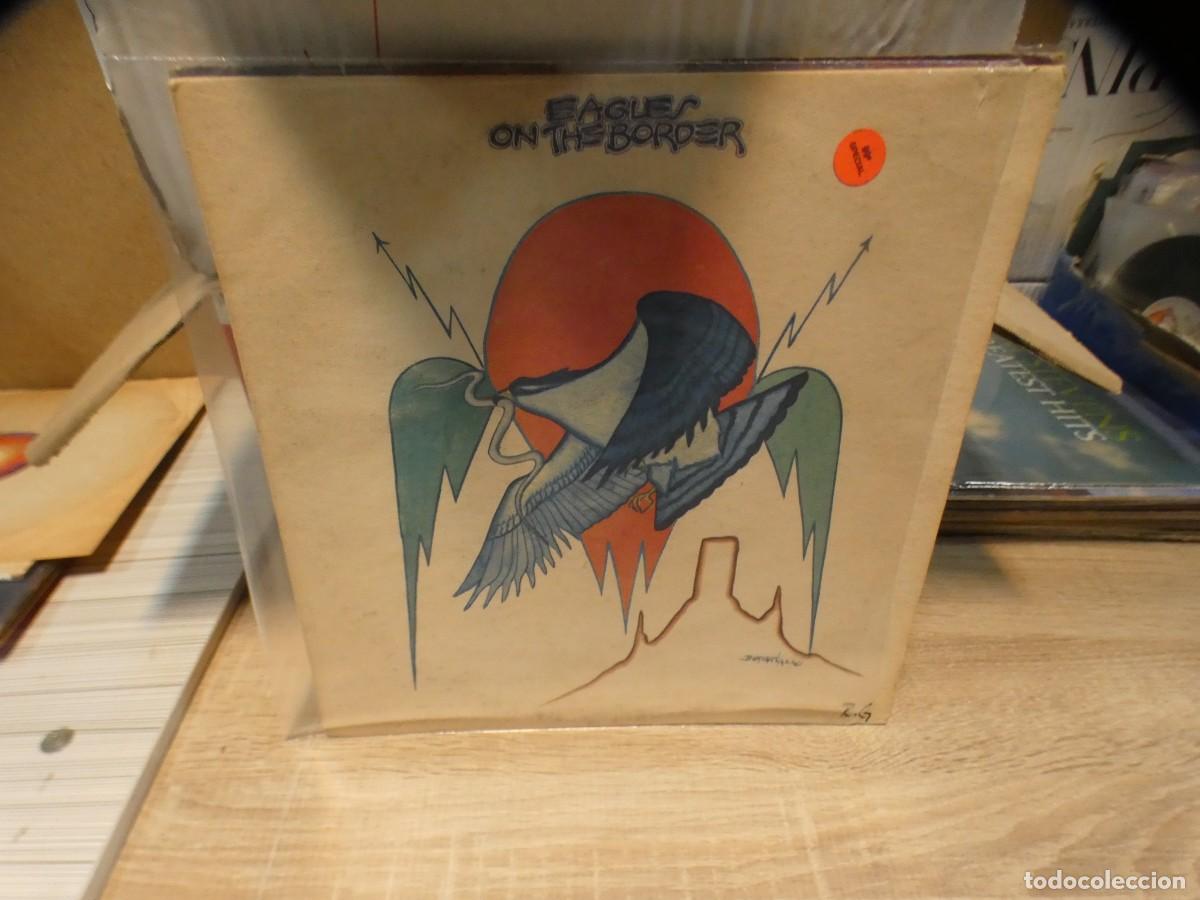 Discos de vinil: ARKANSAS1980 CAJJ714 VINILO LEVE USO AUN CORRECTO EAGLES