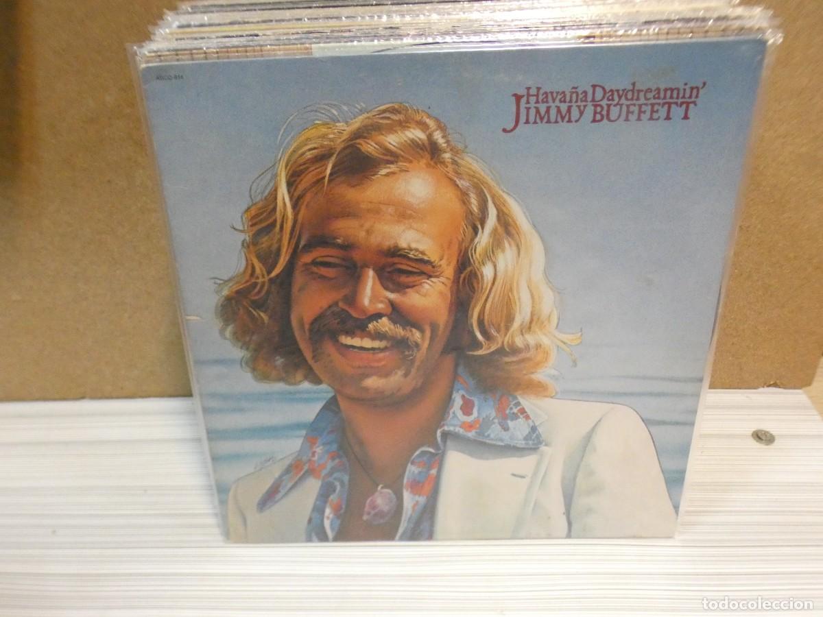 Vinyl records: ARKANSAS1980 PACC702 VINILO LEVE USO ESTADO CORRECTO JIMMY BUFFETT