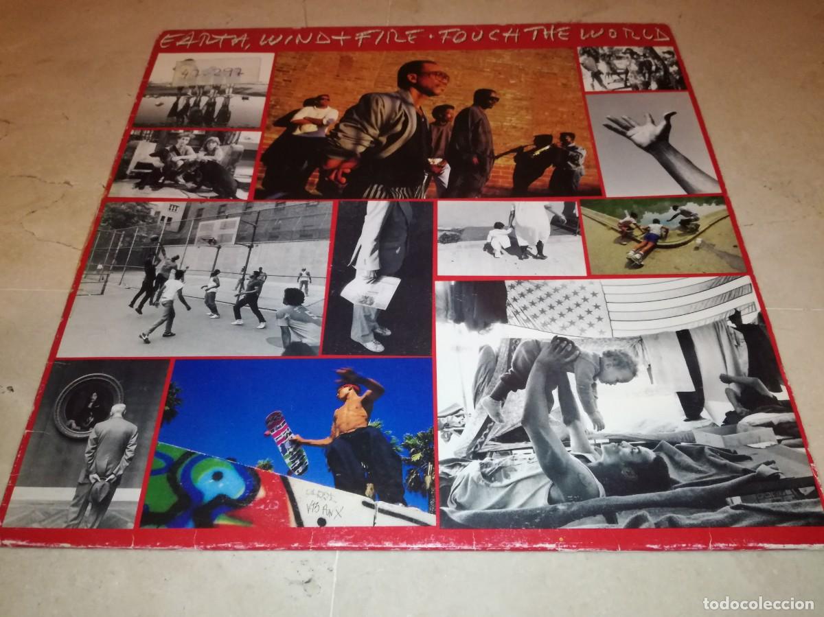 Discos de vinilo: EARTH, WIND & FIRE-TOUCH THE WORLD-CONTIENE ENCARTE-ORIGINAL ESPA&Ntilde;OL 1987