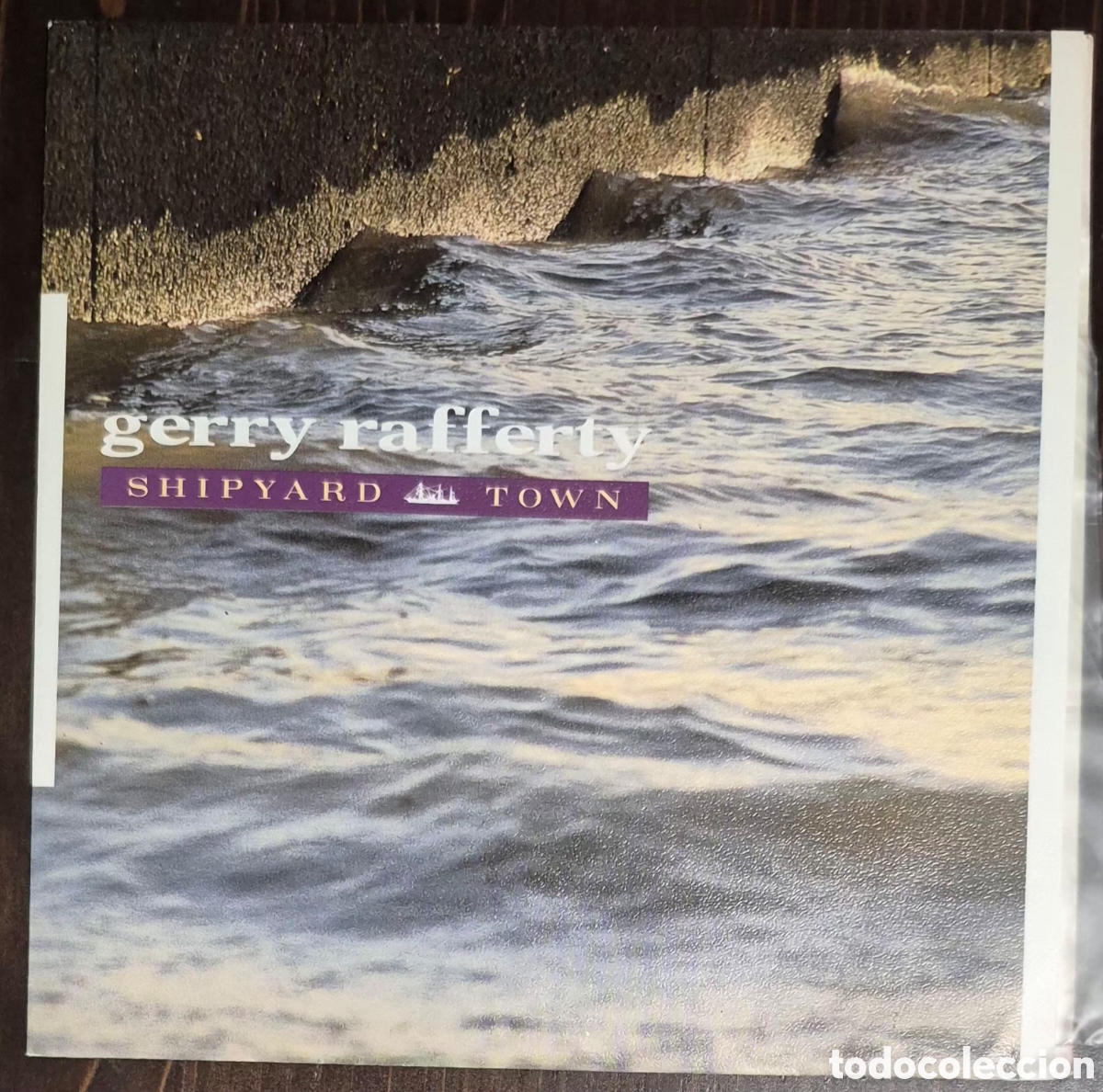 Discos de vinilo: SINGLE - GERRY RAFFERTY - SHIPYARD TOWN - 1988 ESPA&Ntilde;A