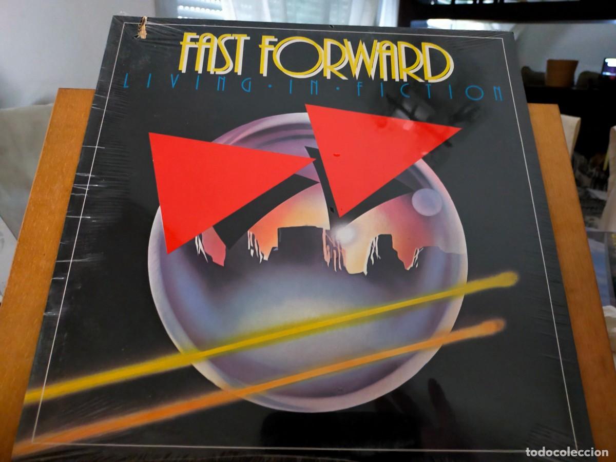 Discos de vinilo: FAST FORWARD. LIVING IN FICTION. PRECINTADO. ISLAND RECORDS. 10 TEMAS. VER DESCRIPCI&Oacute;N. 1984
