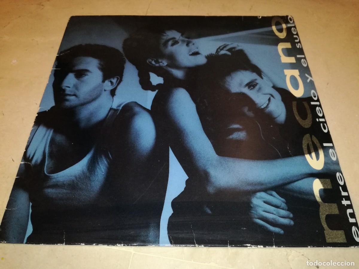 Discos de vinilo: MECANO-ENTRE EL CIELO Y EL SUELO-CONTIENE ENCARTE-ORIGINAL 1986