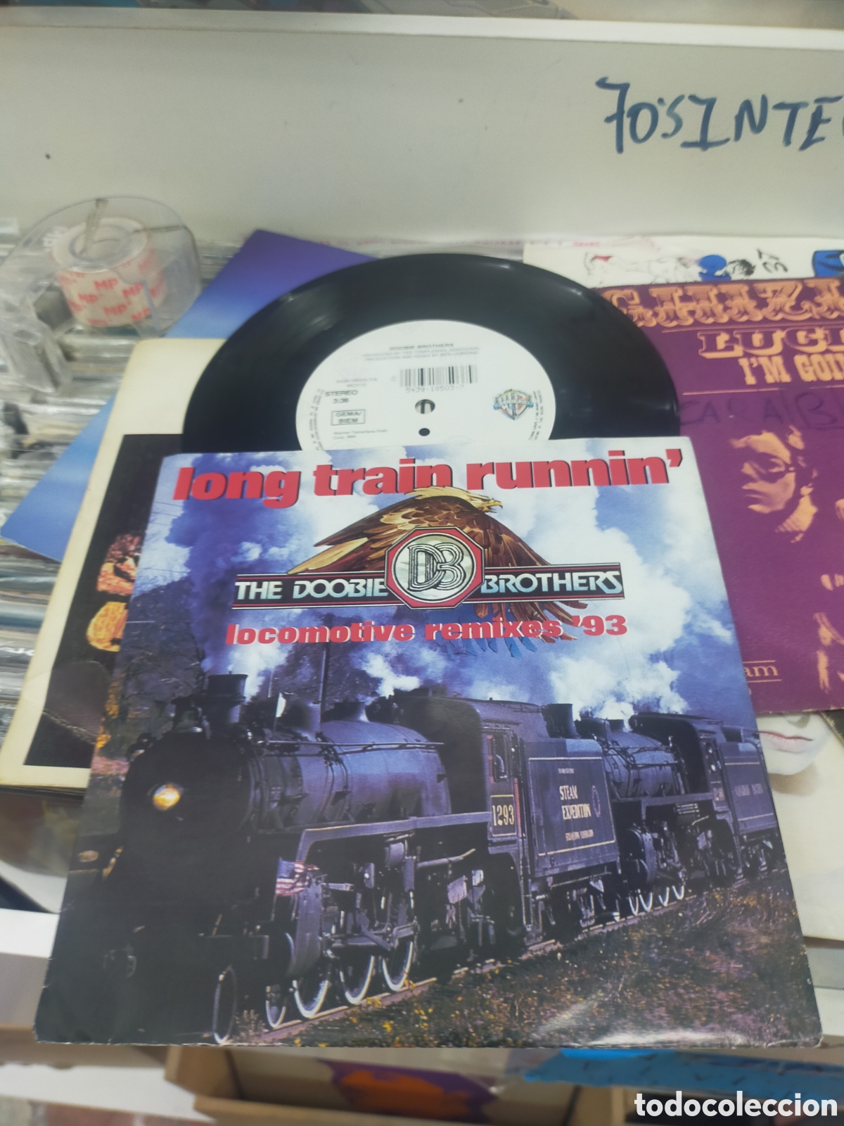 Discos de vinilo: The Doobie brothers single Long train runnin' locomotive remixes '93 Alemania