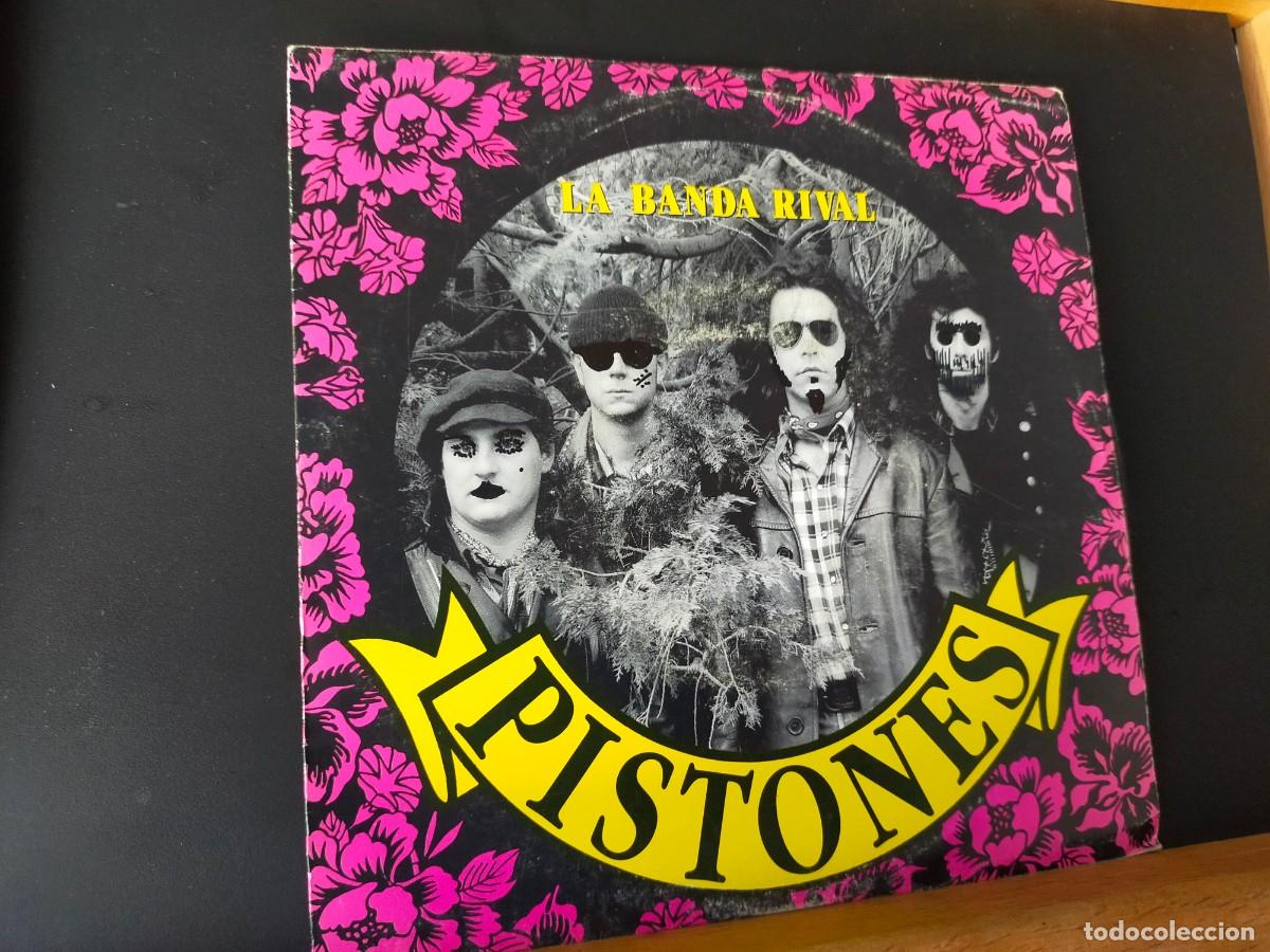 Discos de vinilo: PISTONES. LA BANDA RIVAL. EPIC - SONY MUSIC. 1 TEMA. EXTRA&Iacute;DO DEL &Aacute;LBUM &rdquo;ENTRE DOS FUEGOS&rdquo; 1992