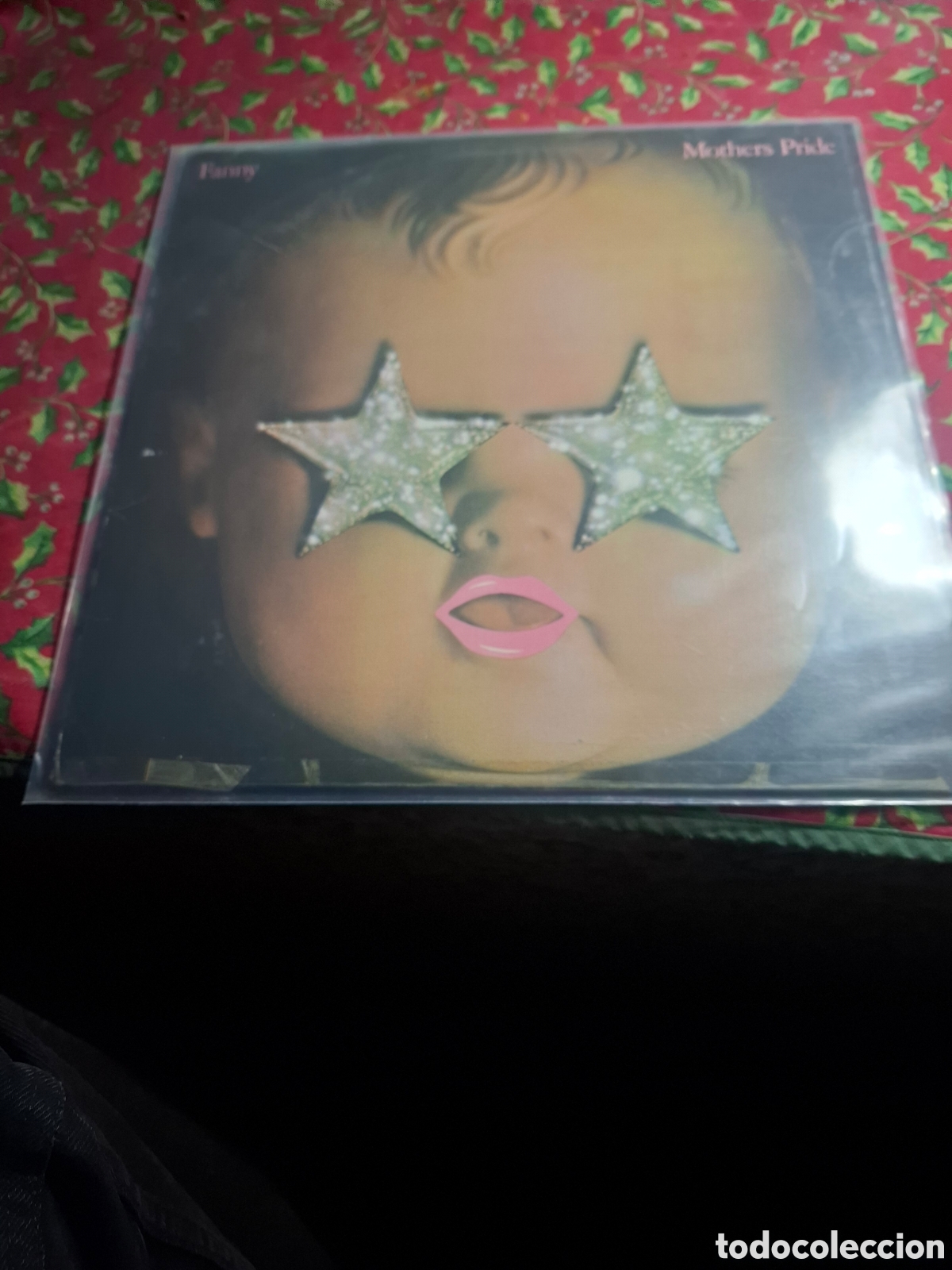 Discos de vinilo: Parte Inferior de portada y contraportada pegada con celo