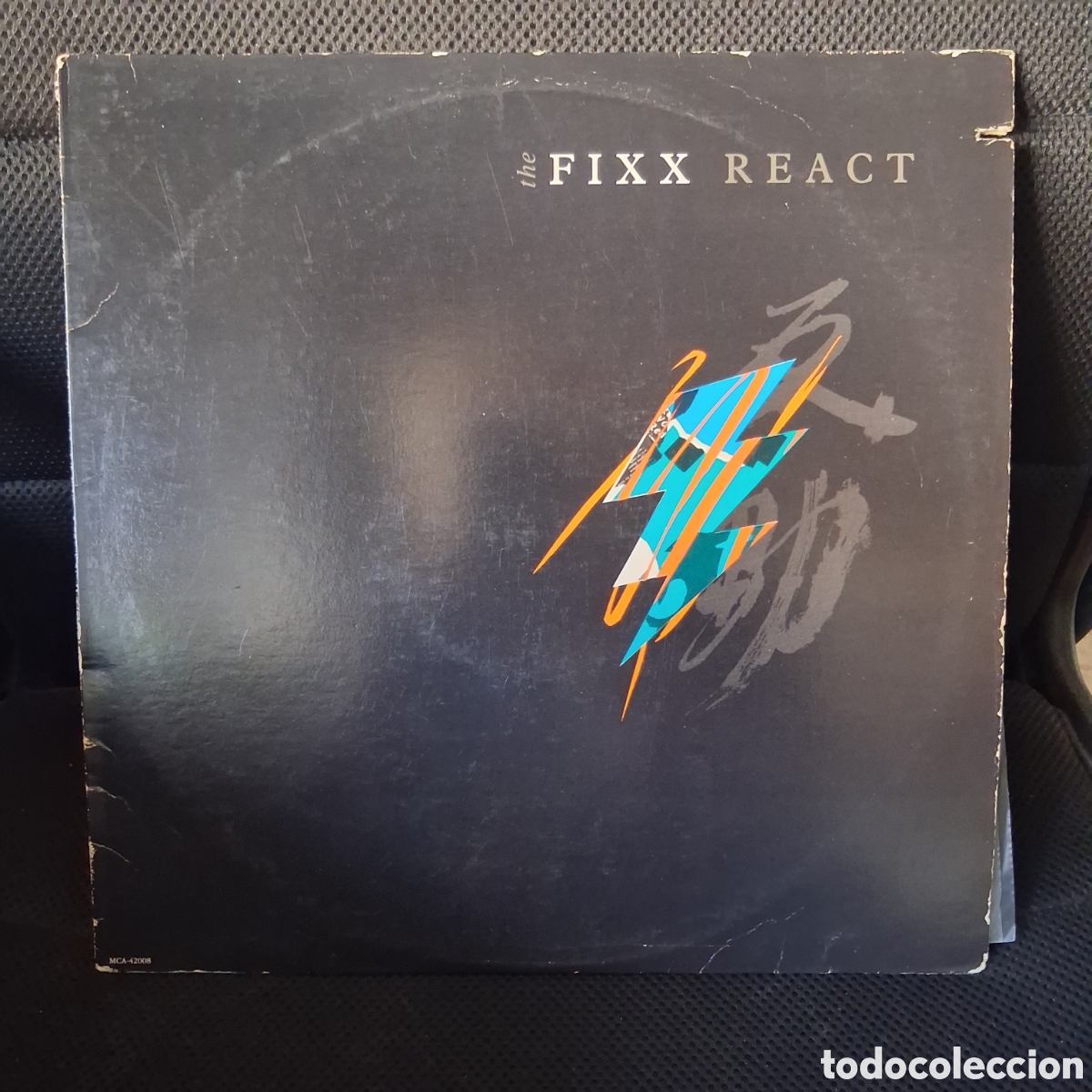 Discos de vinilo: The Fixx &ndash; React MCA-42008 - Foto 1