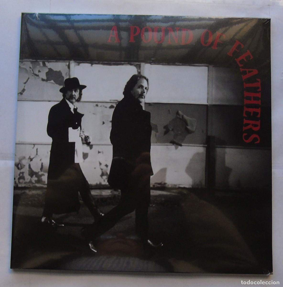 Discos de vinilo: The Black Crowes &ndash; A Pound Of Feathers LP EU Red With Black Splatter vinyl