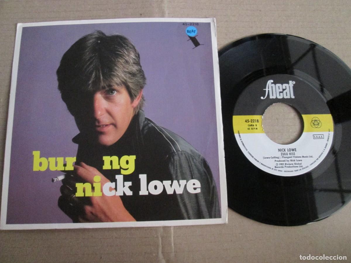 Discos de vinilo: NICK LOWE - Burning / Zulu Kiss. Single, ed espa&ntilde;ola 7&rdquo; 1982. Impecable (NM)