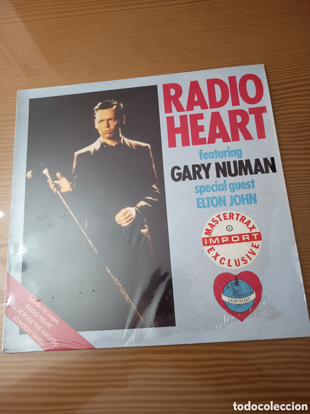 Discos de vinilo: Disco vinilo Gary Numan &rdquo; Radio Heart &rdquo; con Elton John ,como nuevo