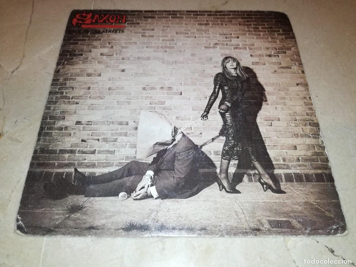 Discos de vinilo: SAXON-BACK ON THE STREETS-ORIGINAL ESPA&Ntilde;OL 1985-VINILO EN BUEN ESTADO