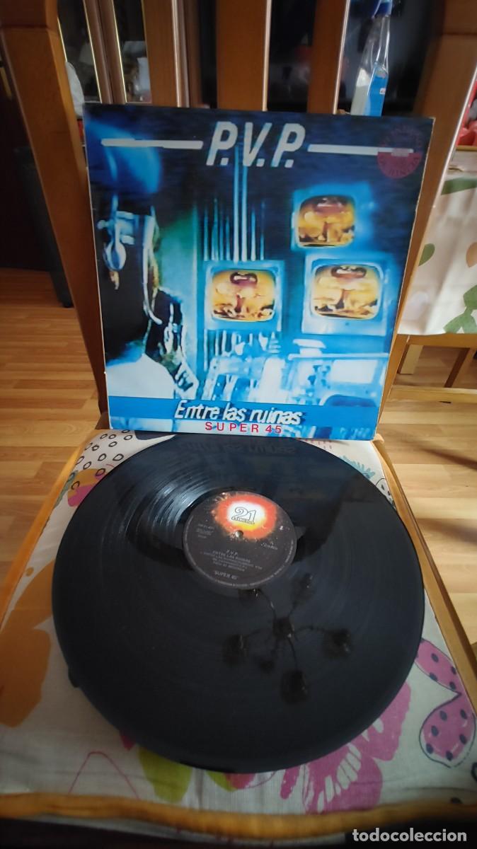 Discos de vinilo: PVP-MAXI ENTRE LAS RUINAS - Foto 1