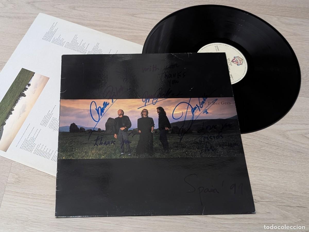 Discos de vinilo: BEE GEES - E.S.P ..LP DE WARNER 1987 ESPA&Ntilde;OL CON LETRAS - BUEN ESTADO ..FIRMADO POR LOS 3 MIEMBROS.