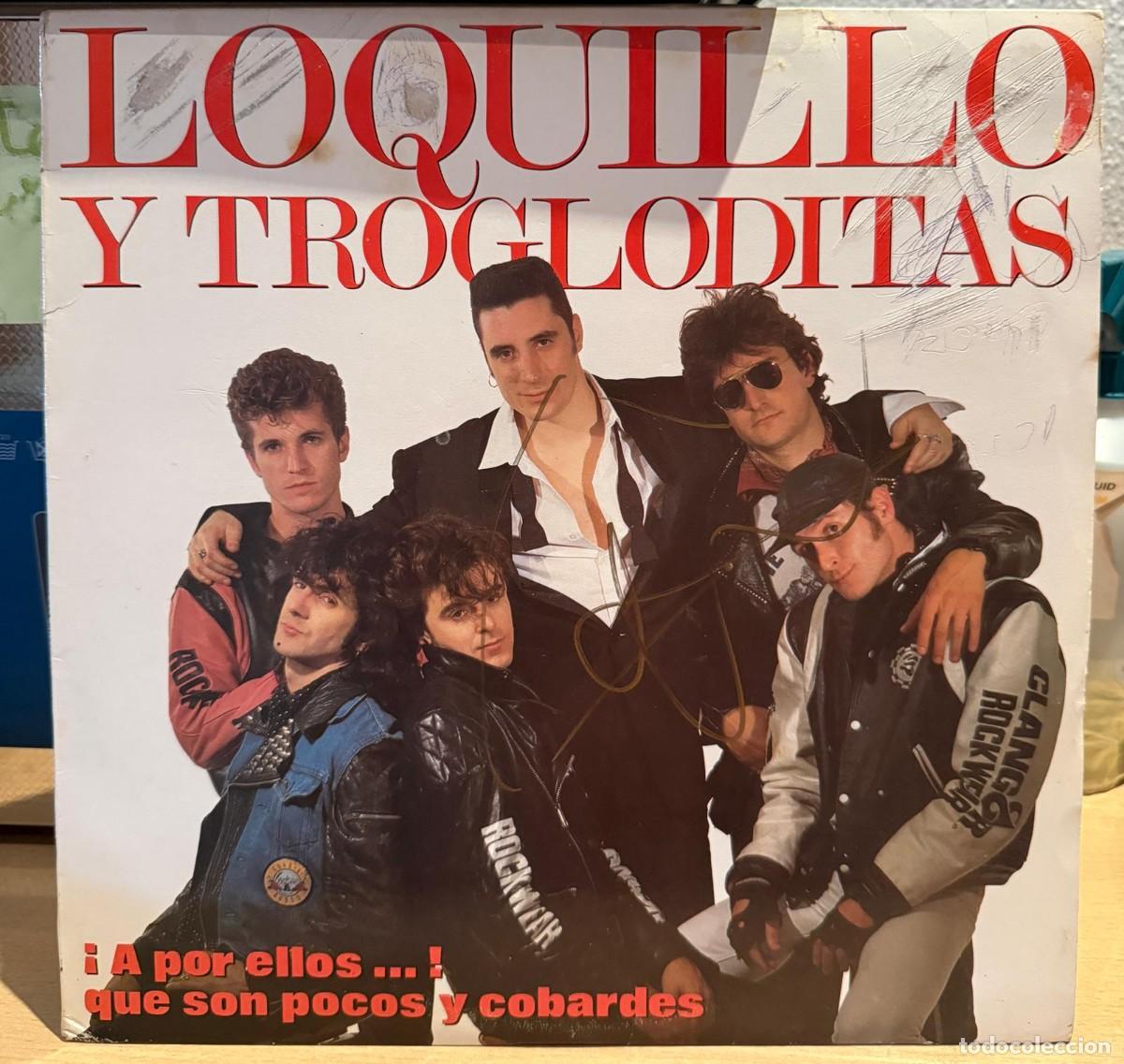 Discos de vinilo: Loquillo Y Trogloditas &lrm;&ndash; &iexcl;A por ellos...! que son pocos y cobardes. Vinilo. Firmado por Loquillo