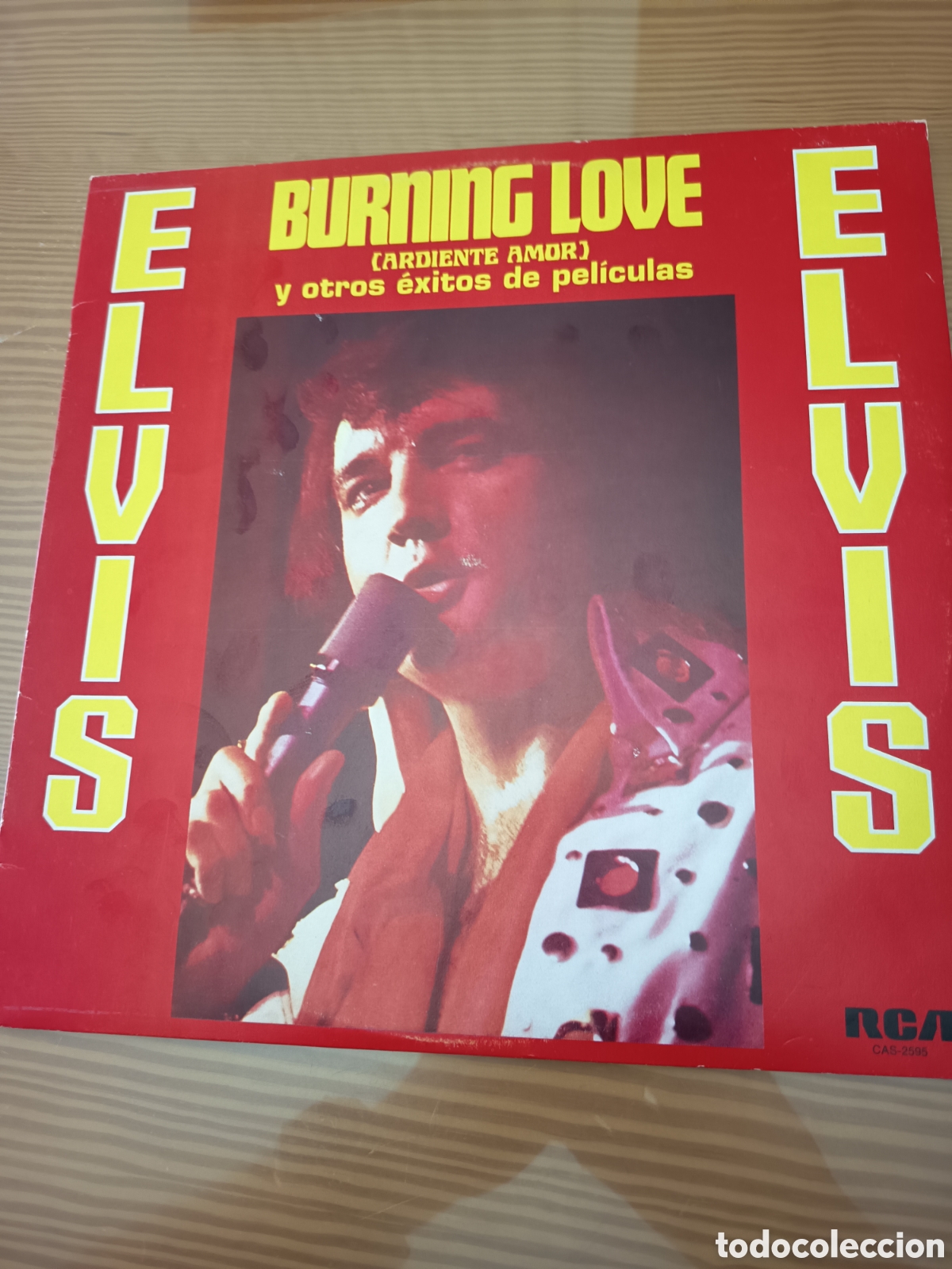 Discos de vinilo: Disco vinilo de Elvis Presley &rdquo; Burning Love &rdquo; como nuevo