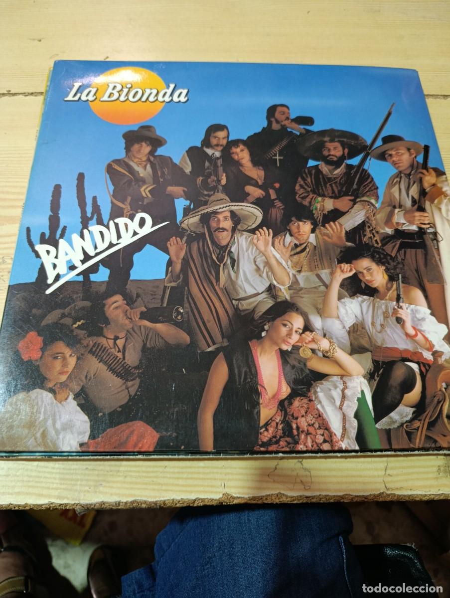 LA BIONDA BANDIDO. C2V