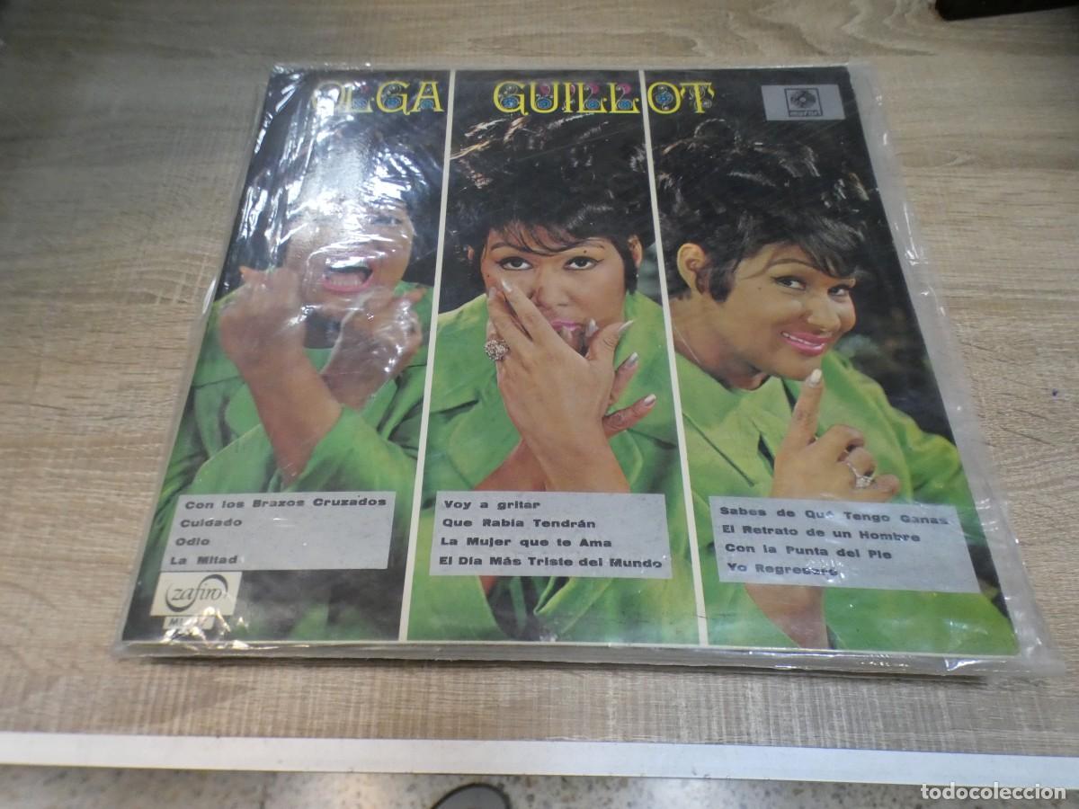 Vinyl records: ARKANSAS1980 EXPRO726 VINILO LEVE USO AUN CORRECTO OLGA GUILLOT