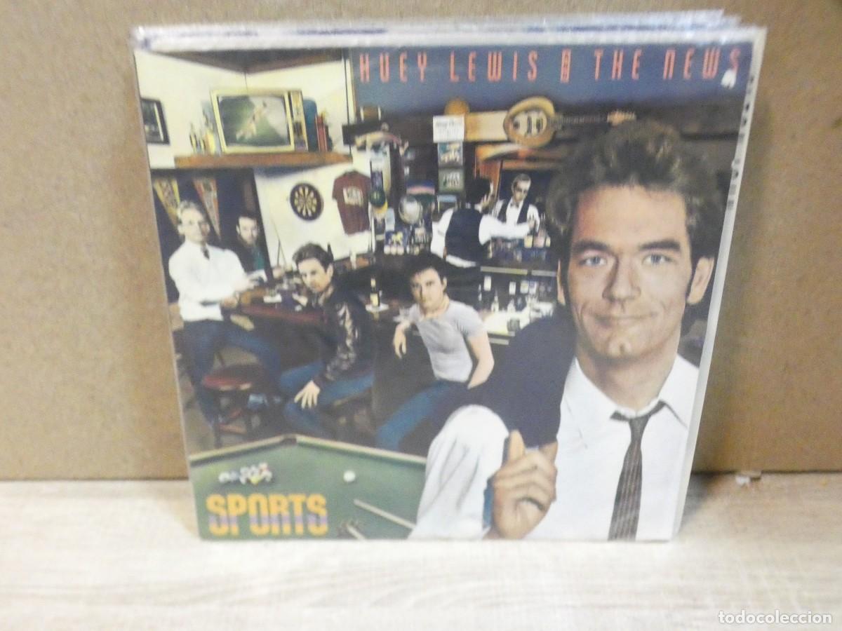 Discos de vinilo: ARKANSAS1980 LOTT744 A LIMPIAR DA&Ntilde;O AGUA TAPA DISCO LEVE USO CORRECTO HUEY LEWIS AND THE NEWS
