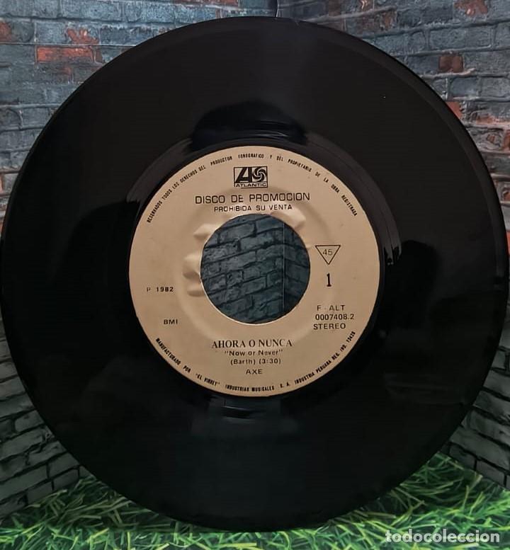 Discos de vinilo: Axe &rdquo;Now or Never&rdquo; single edicion peruana