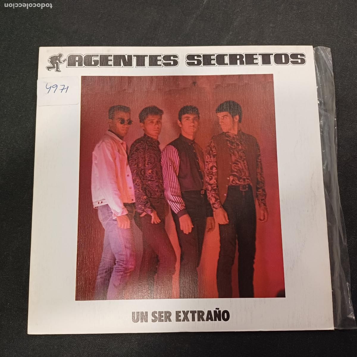 Discos de vinilo: AGENTE SECRETO/UN SER EXTRA&Ntilde;O/SINGLE.