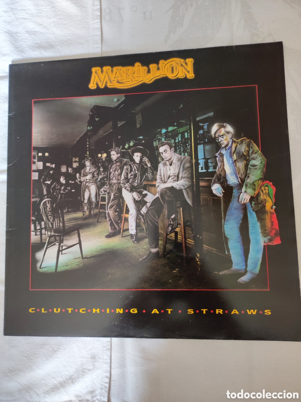 Discos de vinilo: MARILLION - CLUTCHING AT STRAWS
