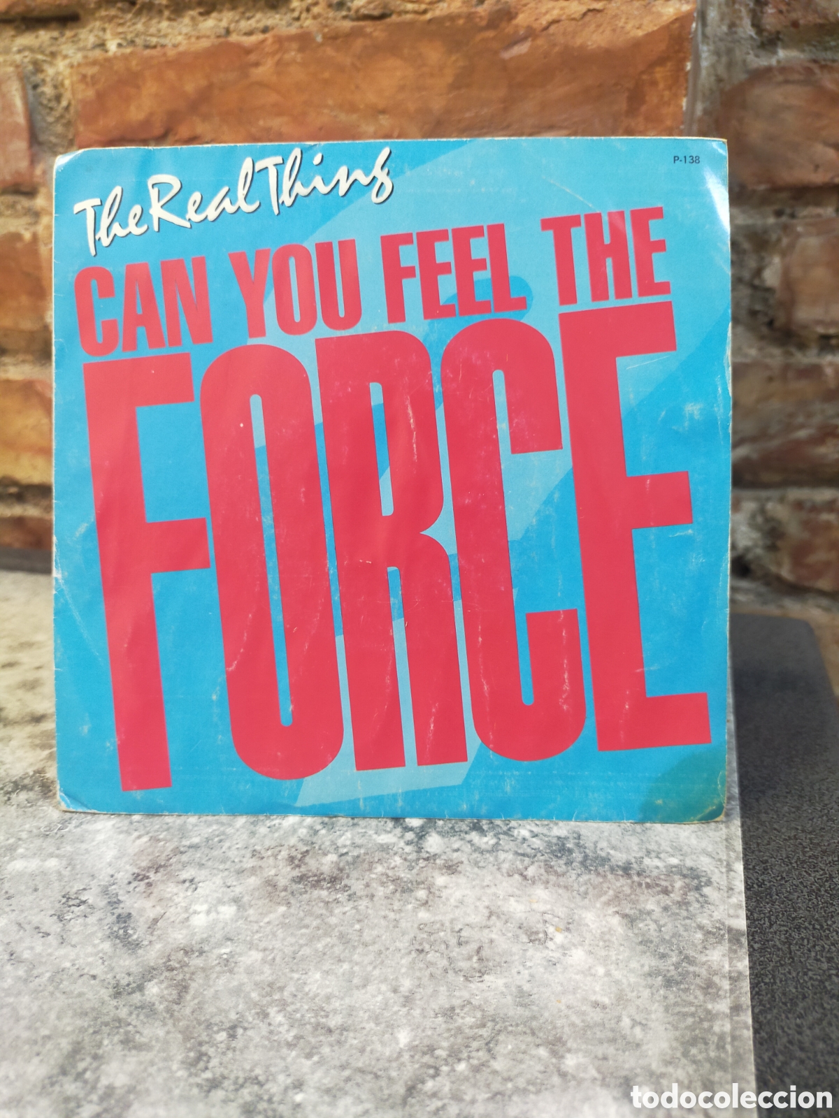 Discos de vinilo: Single THE REAL THING