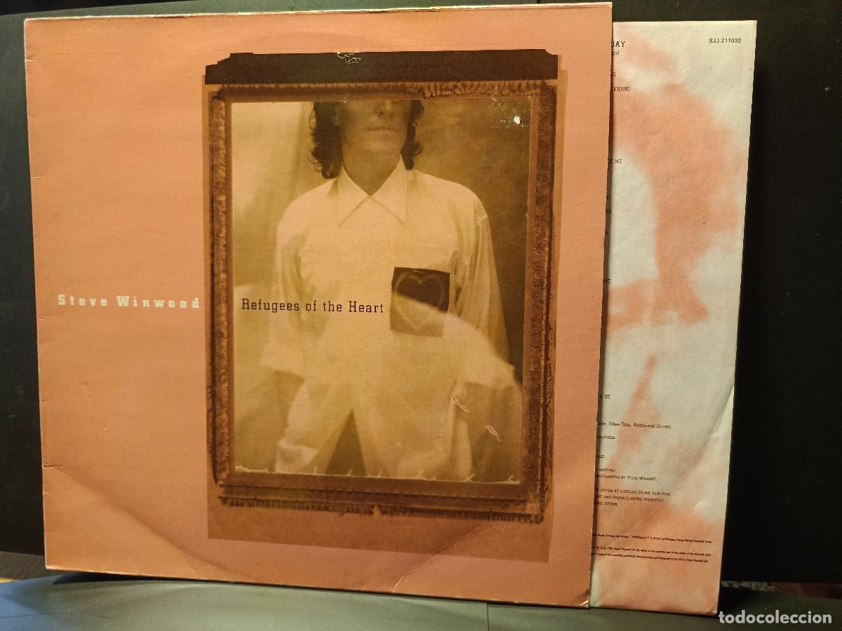 Discos de vinilo: STEVE WINWOOD - TRAFFIC REFUGEES OF THE HEART LP ESPA&Ntilde;A 1990 PDELUXE