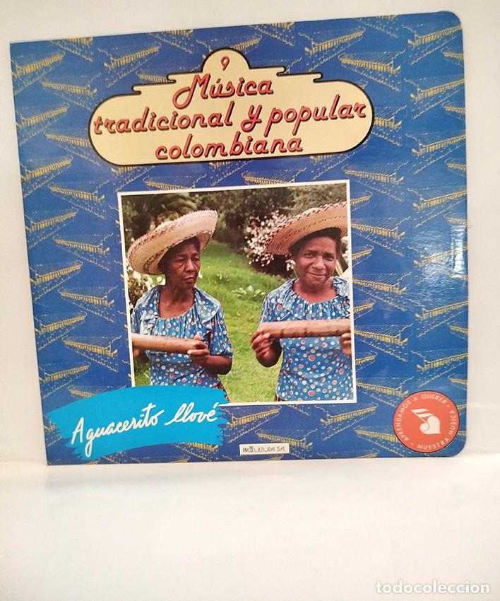 Discos de vinilo: Colombia: M&uacute;sica tradicional y popular colombiana 9. Aguacerito llov&eacute;