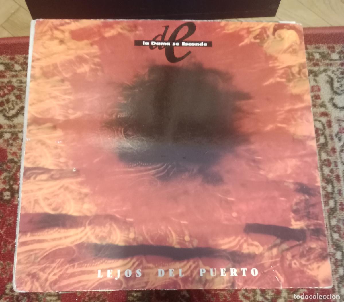 Discos de vinilo: La Dama Se Esconde &ndash; Lejos Del Puerto Lp Espa&ntilde;a 1990