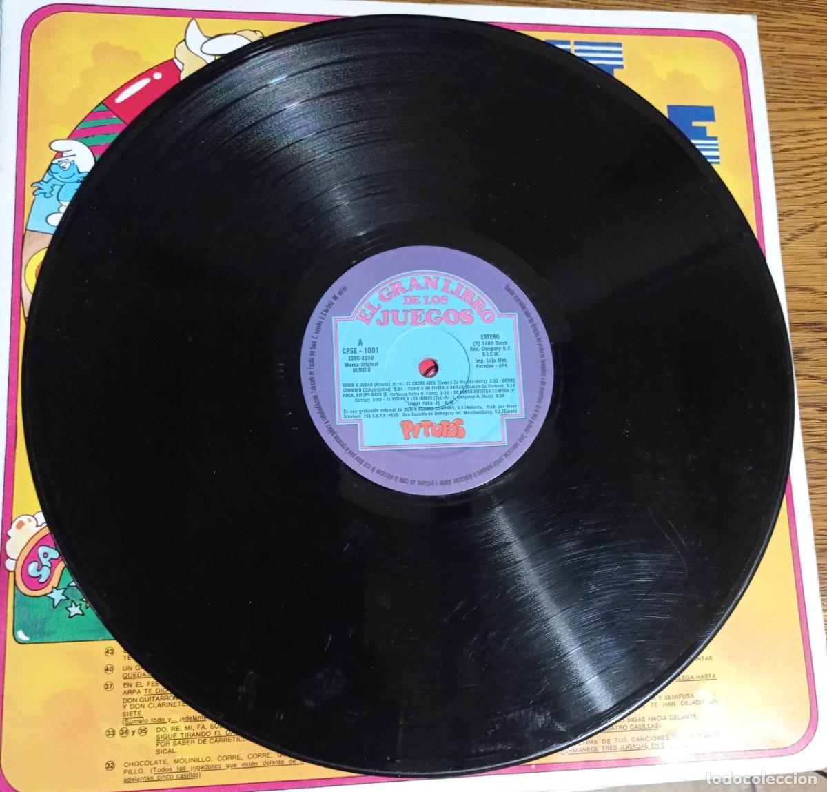Discos de vinilo: LA OCA PITUFA - LP + EL GRAN LIBRO DE LOS JUEGOS PITUFOS - Foto 3