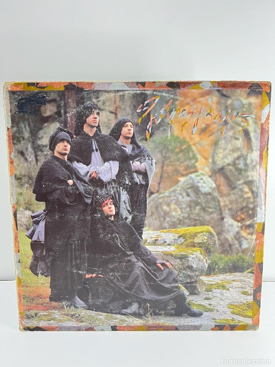 Discos de vinilo: GOLPES BAJOS (LP) A SANTA COMPA&Ntilde;A - A&Ntilde;O 1984 - ENCARTE CON LETRAS