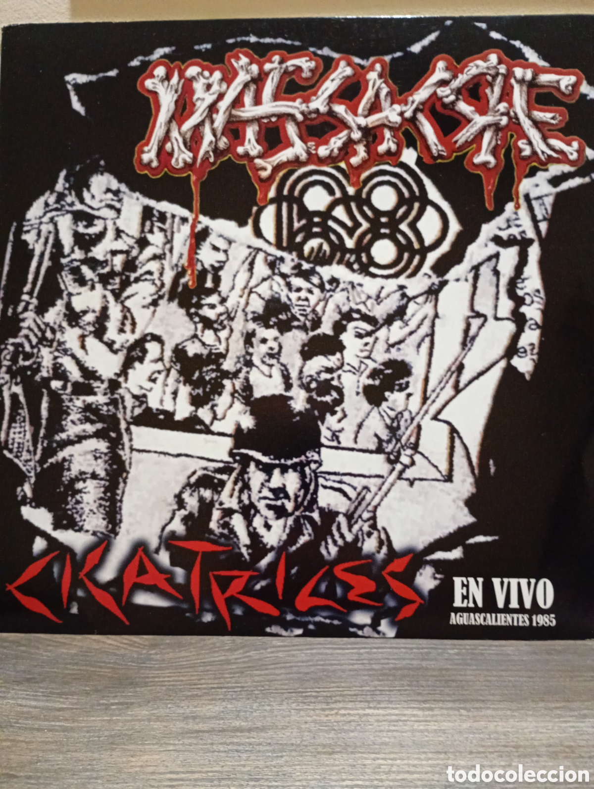 Discos de vinilo: Massacre, 68 cicatrices 2010. + singel.
