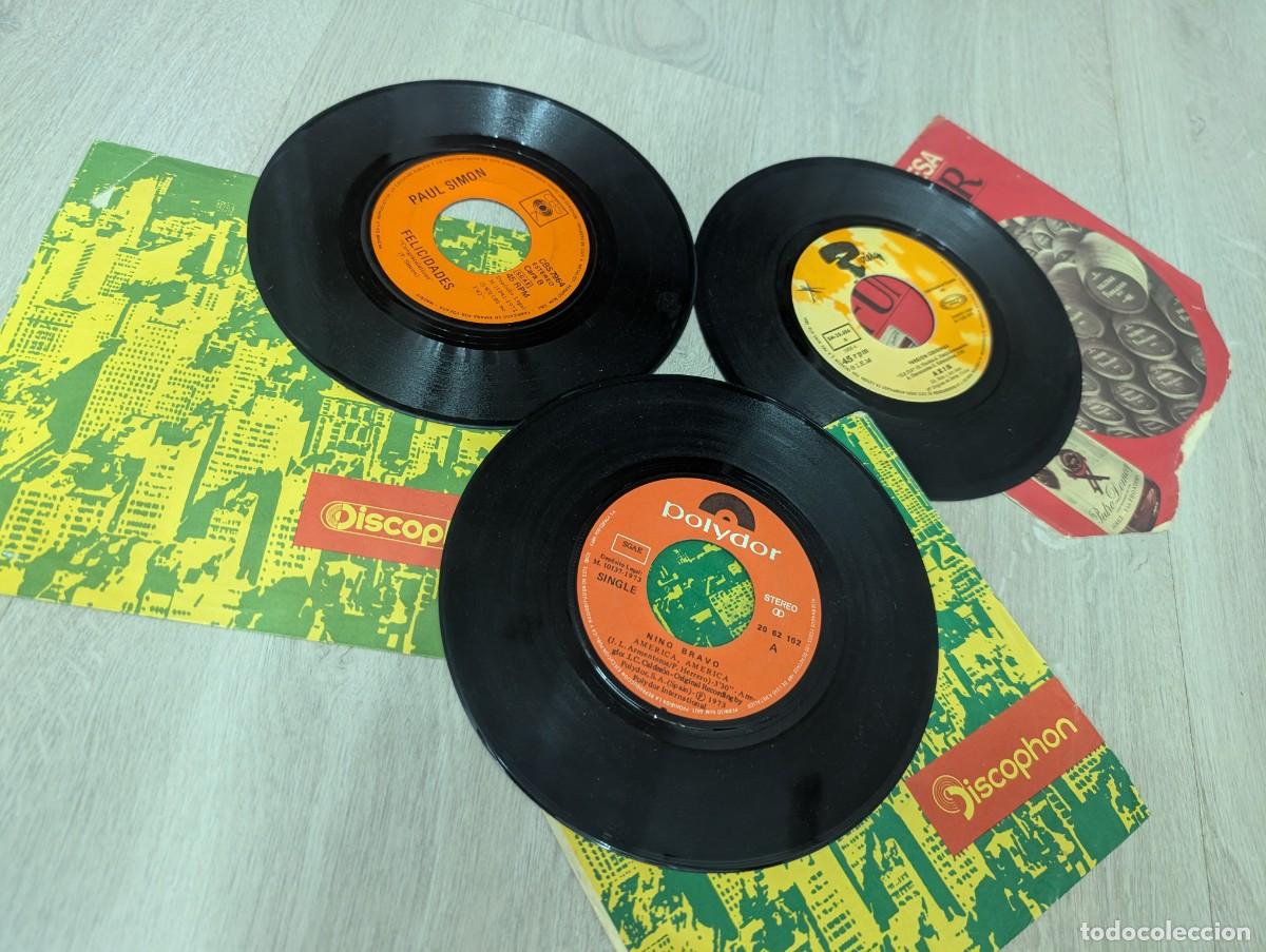 Discos de vinilo: LOTE DE 3 SINGLES VARIADOS - NINO BRAVO - AMERICA AMERICA + PAUL SIMON - FELICIDADES+AXIS - ELA ELA