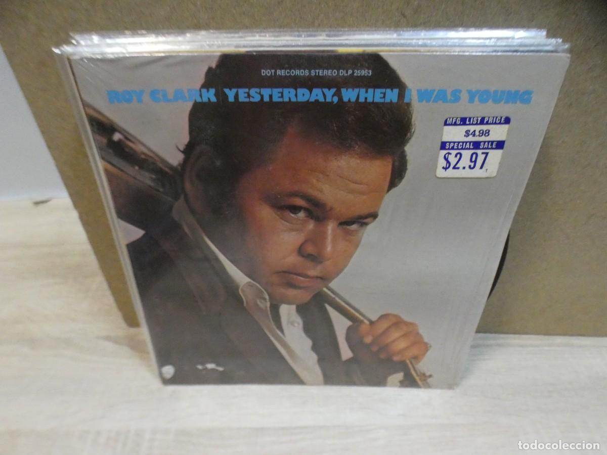 Discos de vinilo: ARKANSAS1980 CAJJ773 VINILO DA&Ntilde;O AGUA EN TAPA ESTADO CORRECTISIMO ROY CLARK