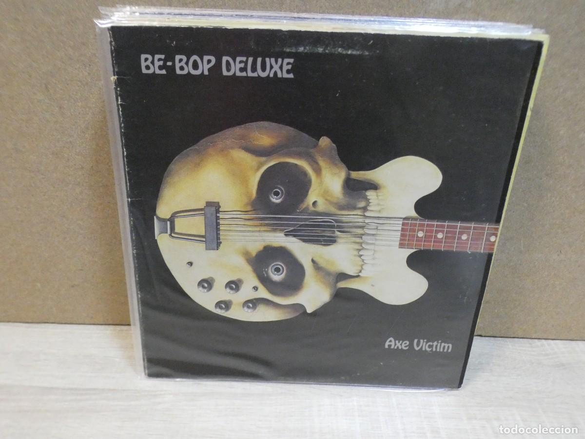 Vinyl records: ARKANSAS1980 BOXX743 VINILO LEVE USO AUN CORRECTO AXE VICTIM