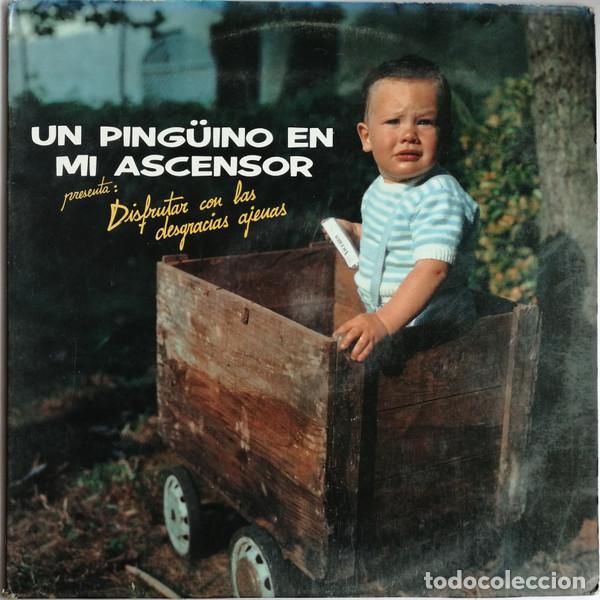 Discos de vinilo: - LP Un Ping&uuml;ino En Mi Ascensor, Disfrutar Con Las Desgracias Ajenas