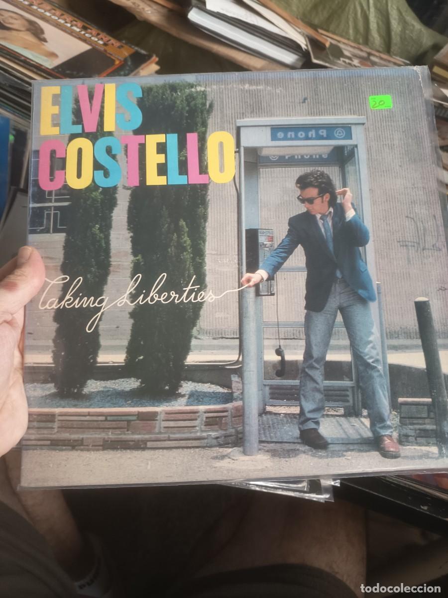 Discos de vinilo: LP ELVIS COSTELLO,( TALKING LIBERTIES)