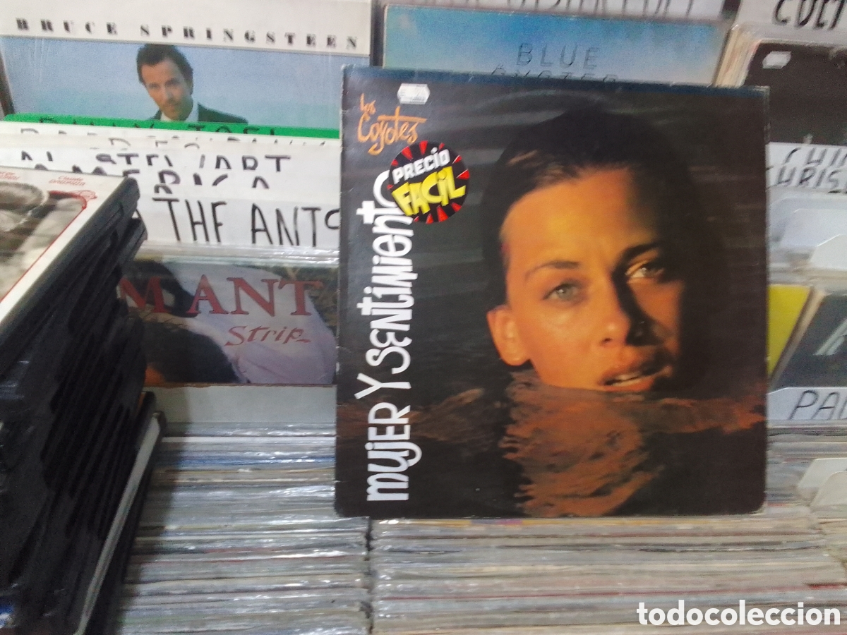Discos de vinilo: Mujer y sentimiento,los coyotes