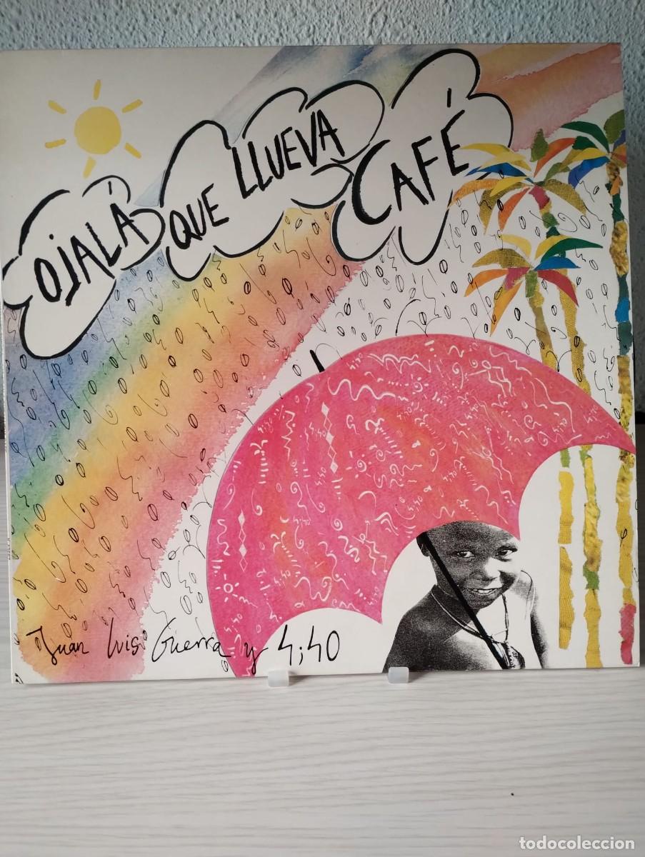 Discos de vinilo: JUAN LUIS GUERRA Y 440 Ojal&aacute; Que Llueva Caf&eacute; / Woman Del Callao (Karen Records K13567, Espa&ntilde;a 1990)