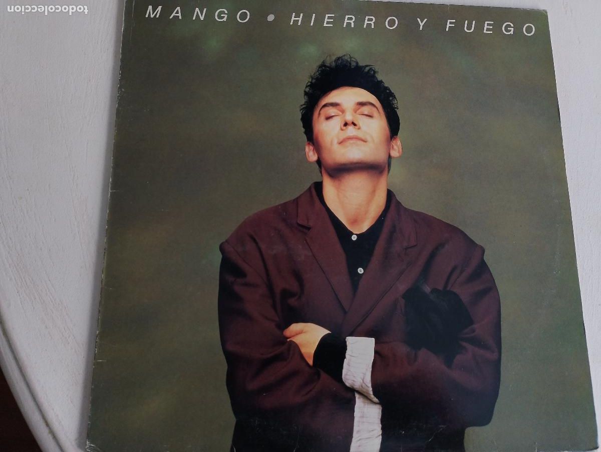 Discos de vinilo: Mango&ndash; Hierro Y Fuego, ed espa&ntilde;ola,1988 contiene el encarte Electronic, Pop Synth-pop