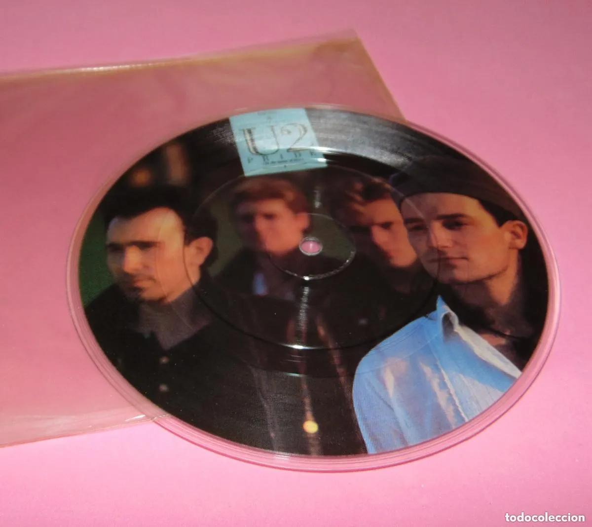Discos de vinilo: U2 - PRIDE (IN THE NAME OF LOVE) - SINGLE PICTURE DISC 1984 - CLEAR RIM - RARO Y DIF&Iacute;CIL