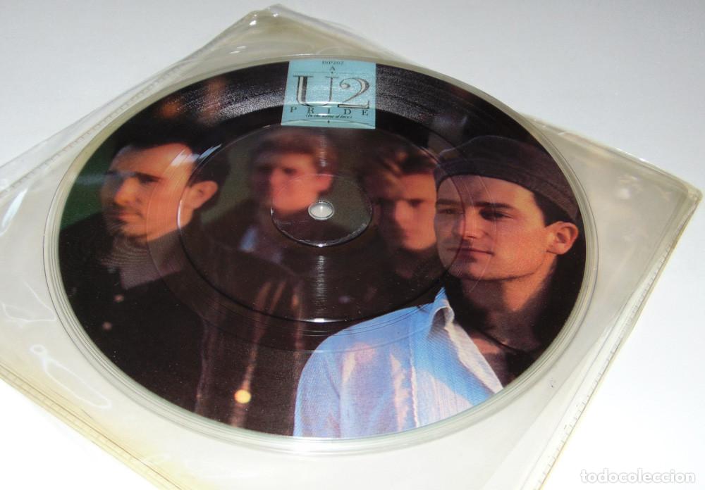 Discos de vinilo: U2 - PRIDE (IN THE NAME OF LOVE) - SINGLE PICTURE DISC 1984 - CLEAR RIM - RARO Y DIF&Iacute;CIL
